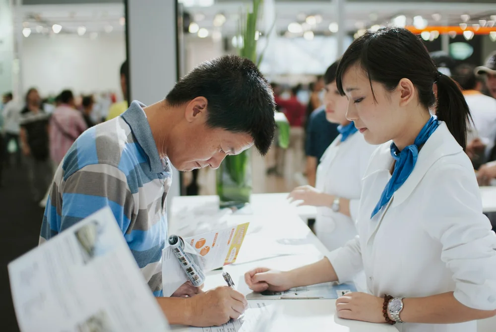 Client completing documents during a mobile appointment